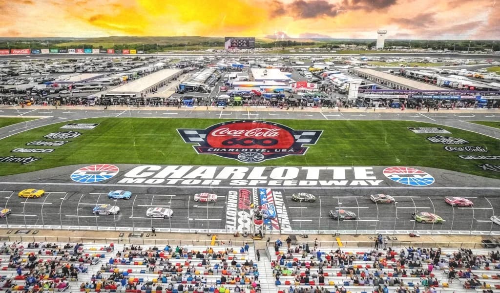 Aerial view of the Charlotte Motor Speedway infield at sunset
