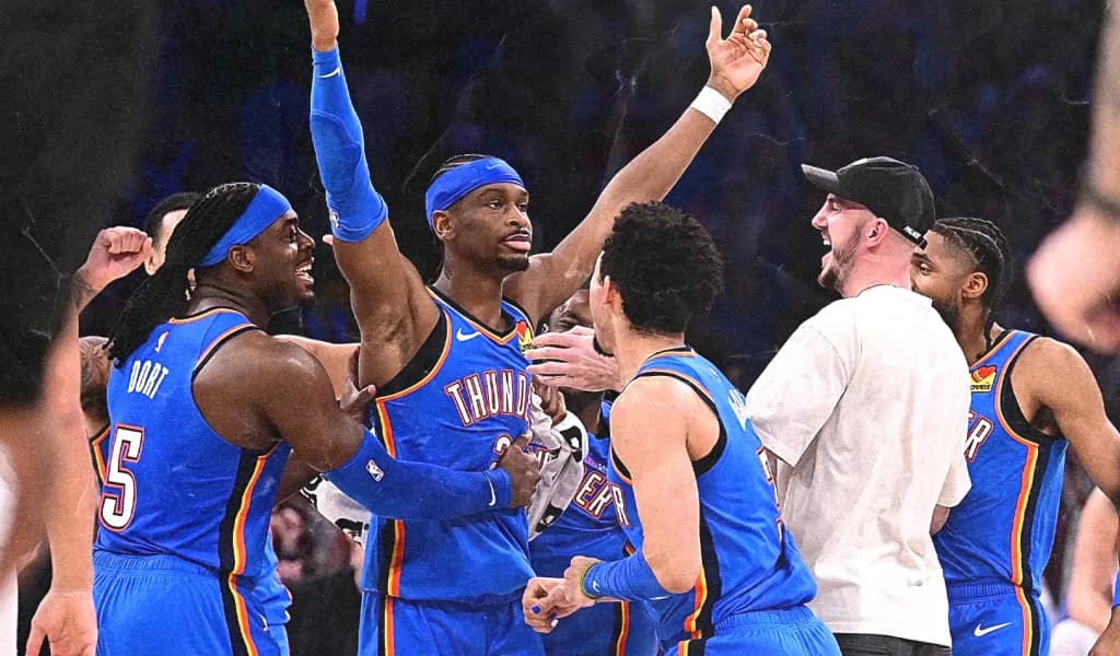 Shai Gilgeous-Alexander and Thunder teammates celebrate courtside