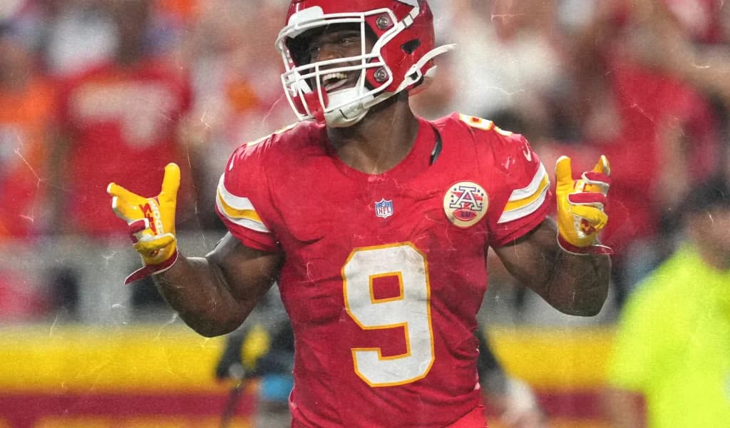 A Kansas City Chiefs player in the red number 9 jersey celebrates toward the crowd.