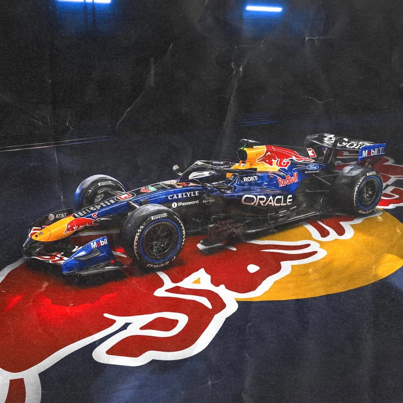 A Red Bull Formula 1 car parked on a giant Red Bull logo floor.