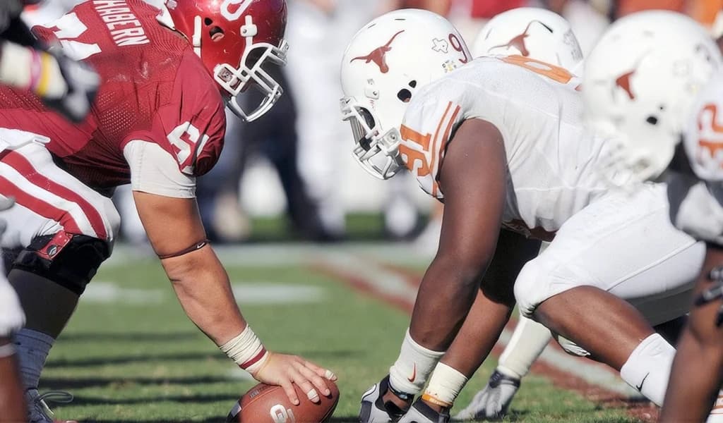 Oklahoma center prepares to snap against the Texas defensive front